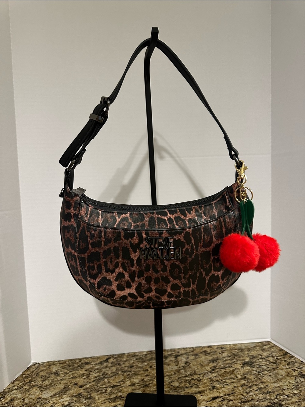 Leopard-Print Crescent Shoulder Bag by Steve Madden w/ cherry bag charm 🍒